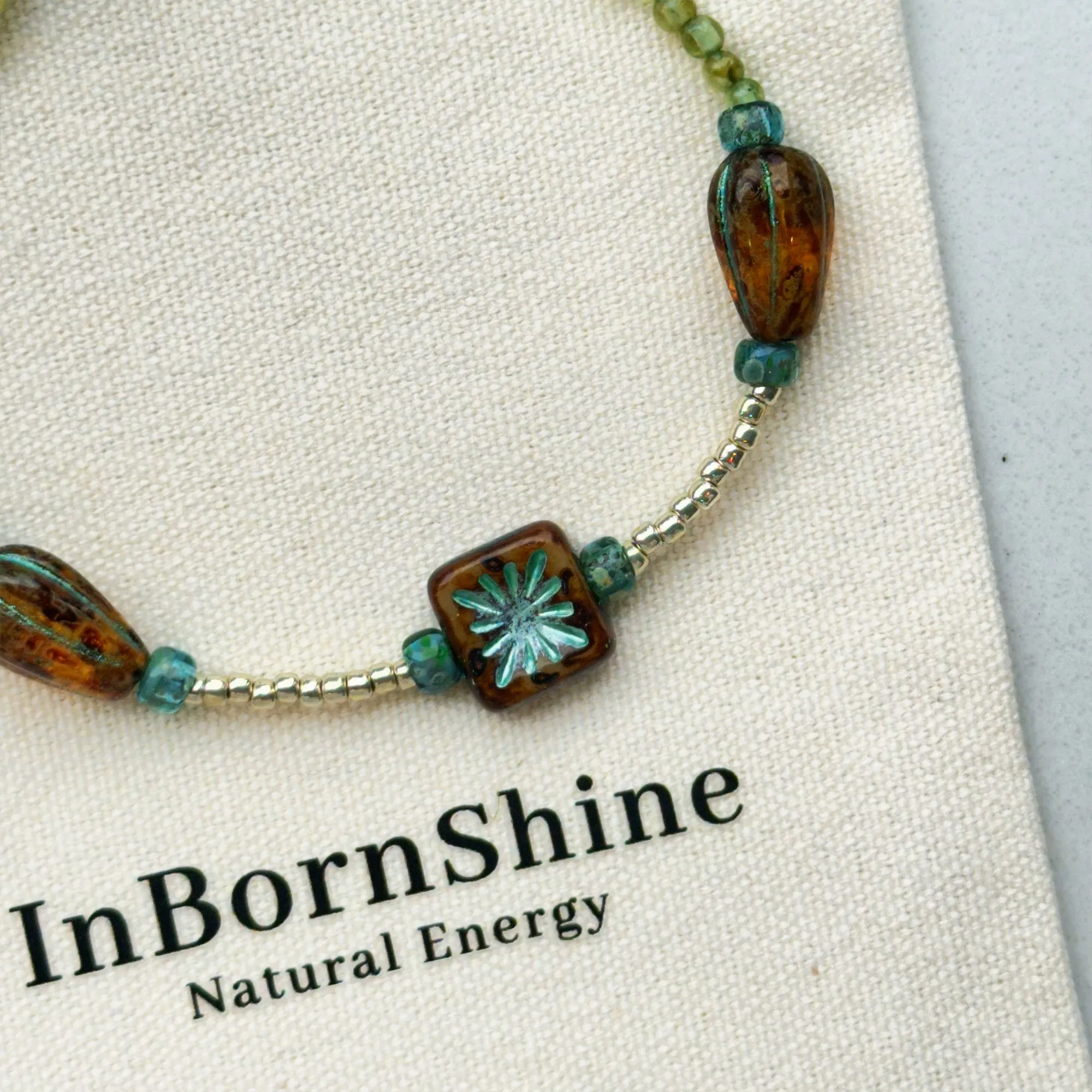 Picasso coloured firework Czech beads with peridot, silver bracelet