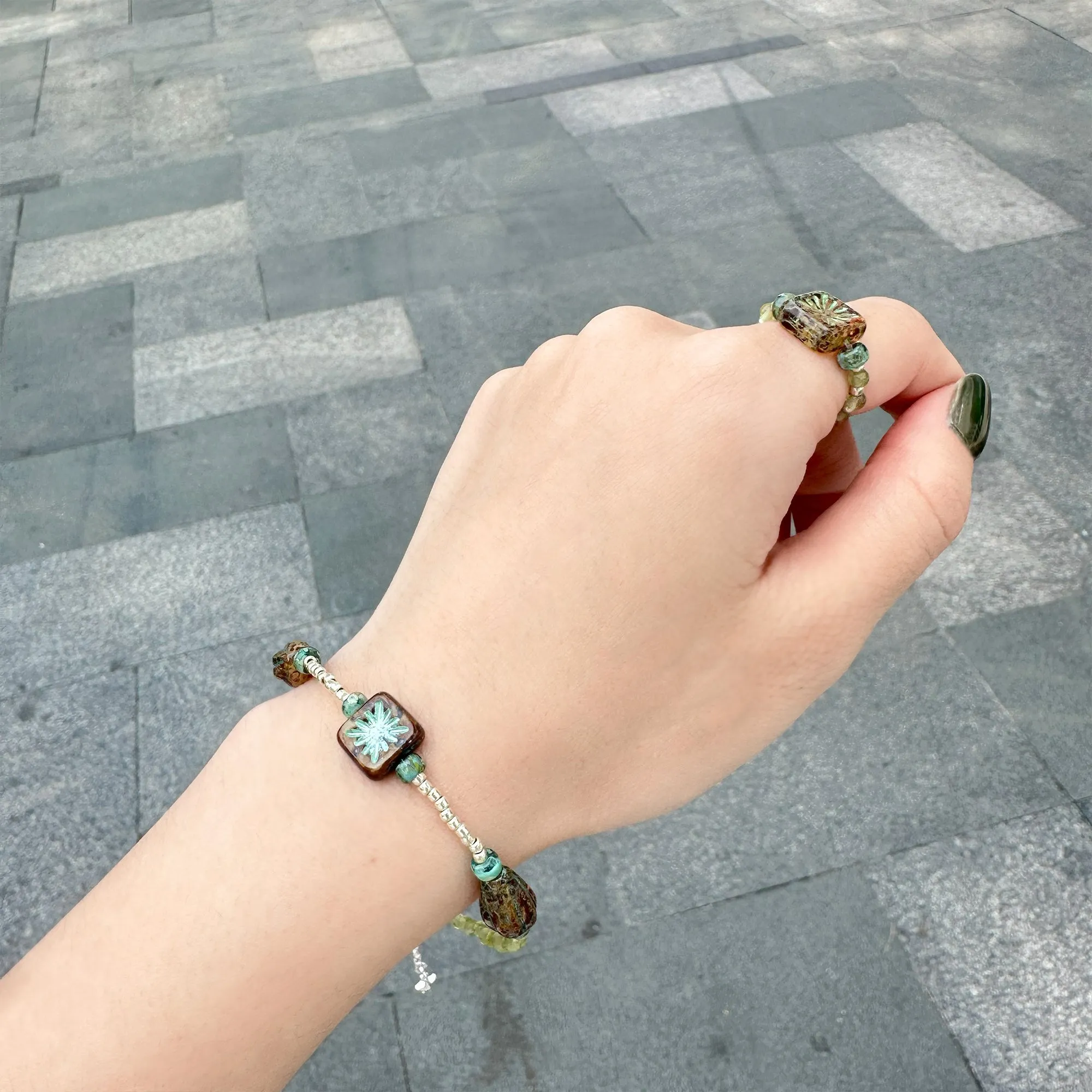 Picasso coloured firework Czech beads with peridot, silver bracelet